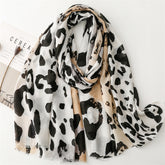 Spring and summer four seasons thin cotton and linen feel scarf European and American cloud leopard print rough edge scarf warm shawl women