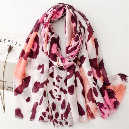 Spring and summer four seasons thin cotton and linen feel scarf European and American cloud leopard print rough edge  scarf warm shawl women